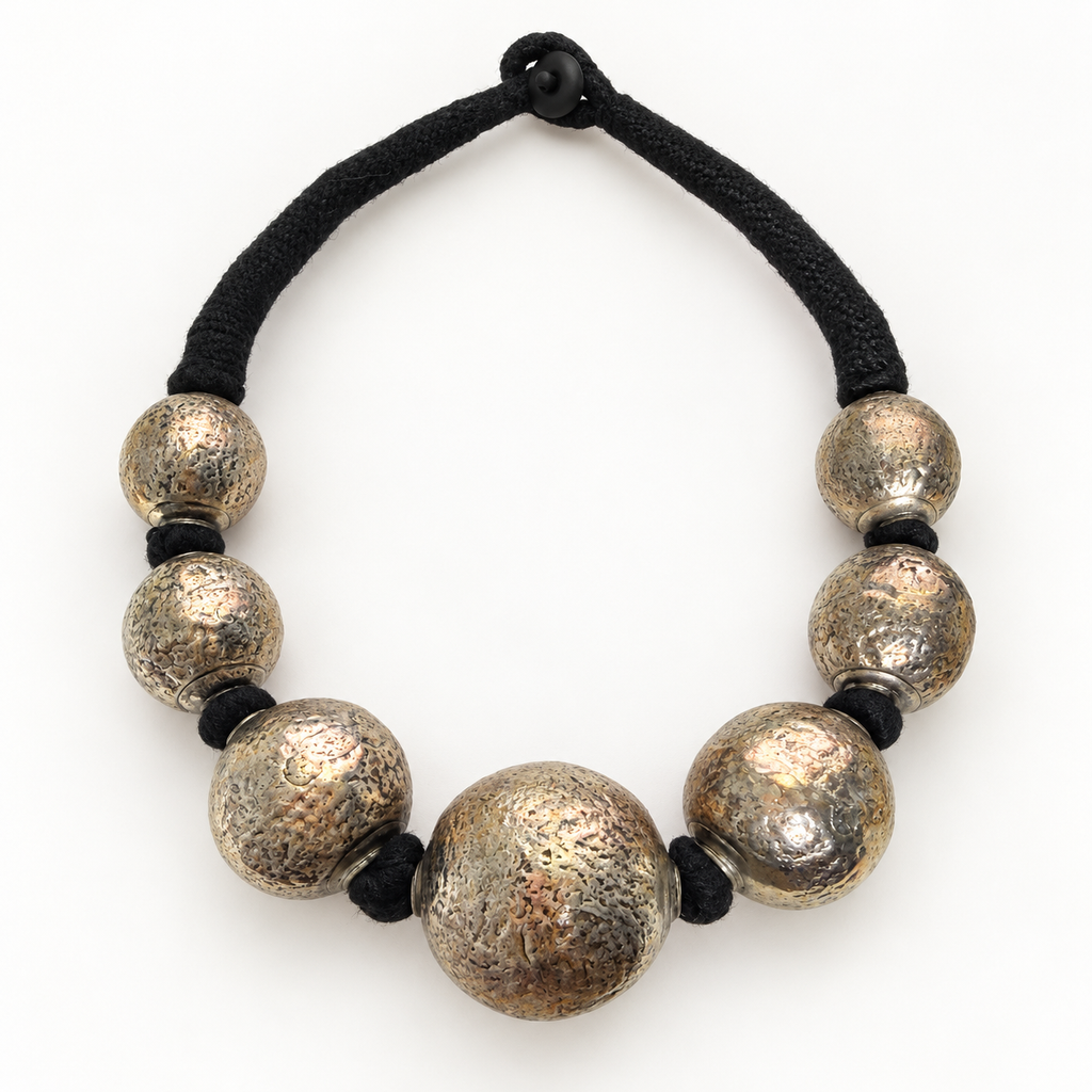 Silver brass ball necklace flat view