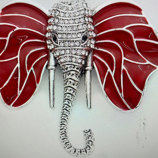 red ele embellished brooch