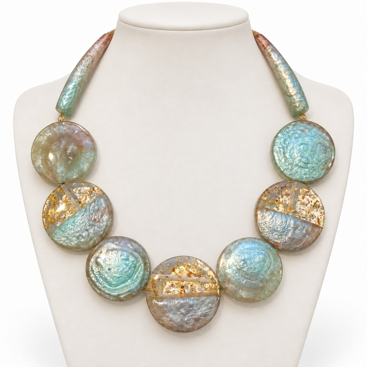 Mosaic Glow Disc Necklace in Aqua and Taupe on a pale necklace bust
