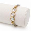 Pearlescent Trio Mesh Bracelet on a light bracelet holder