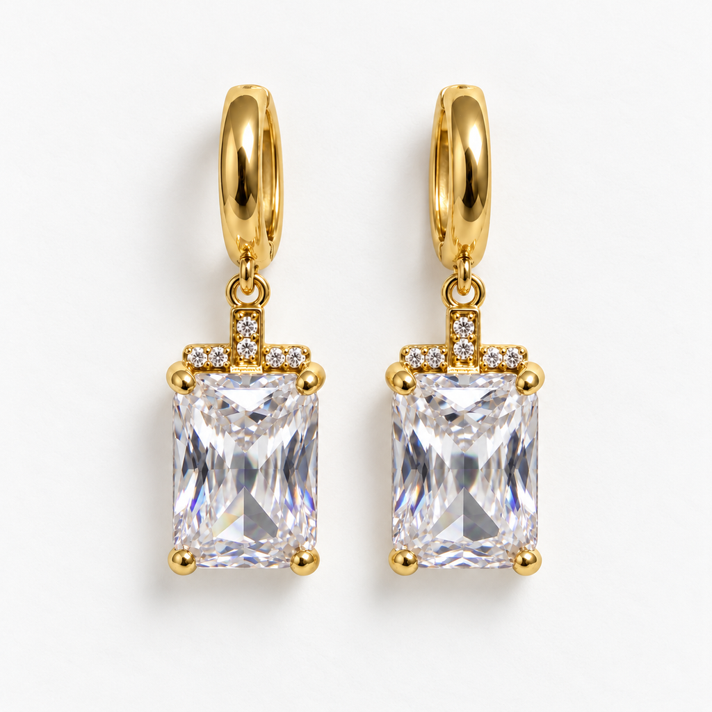 Gold and clear rectangular gemstone drop huggie earrings, flat view