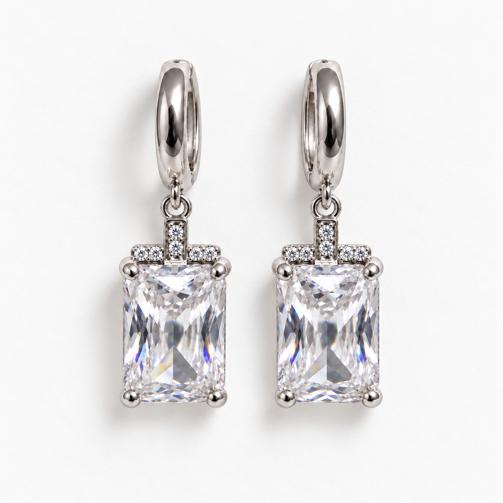 Silver and clear rectangular gemstone drop huggie earrings, flat view