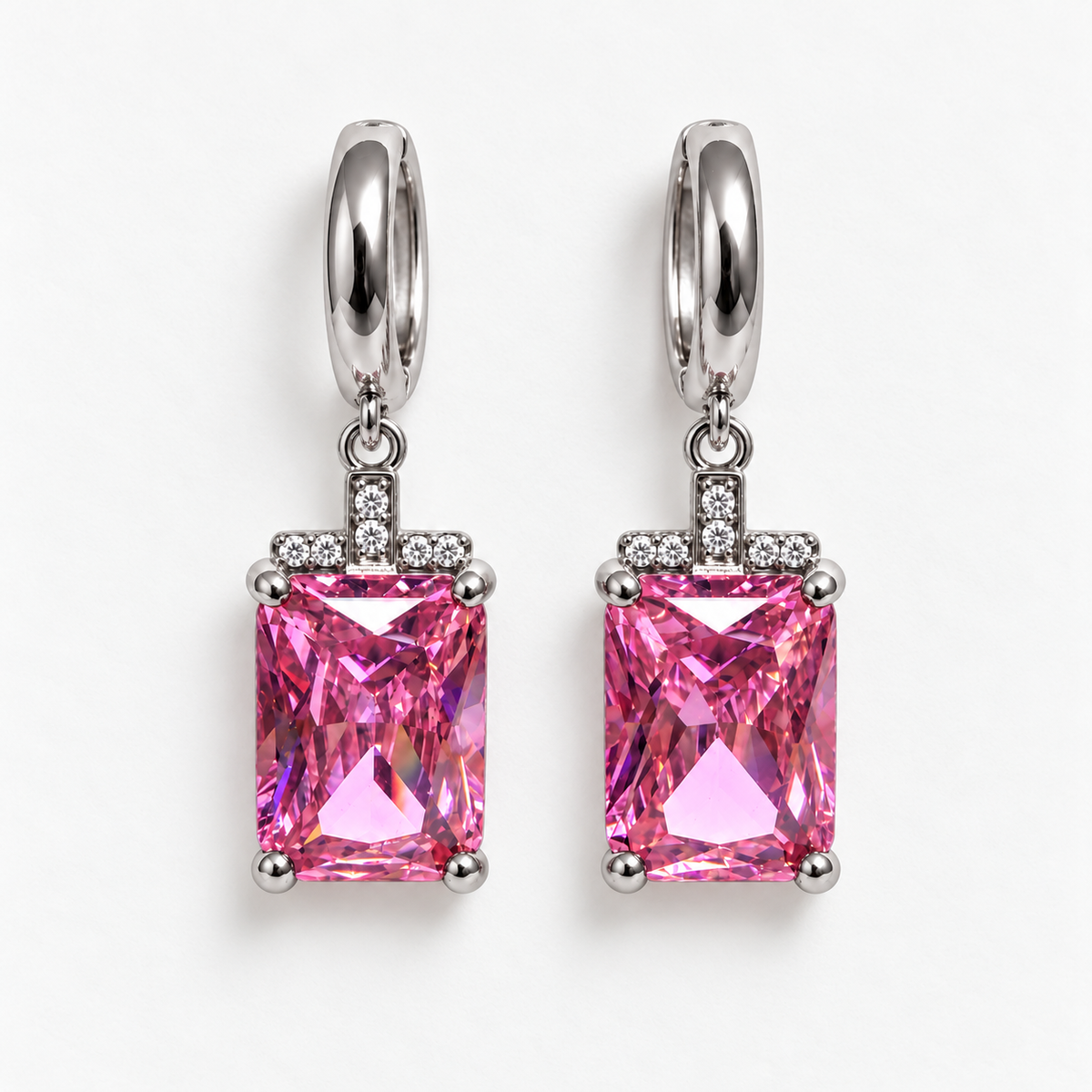 Silver and pink rectangular gemstone drop huggie earrings, flat view