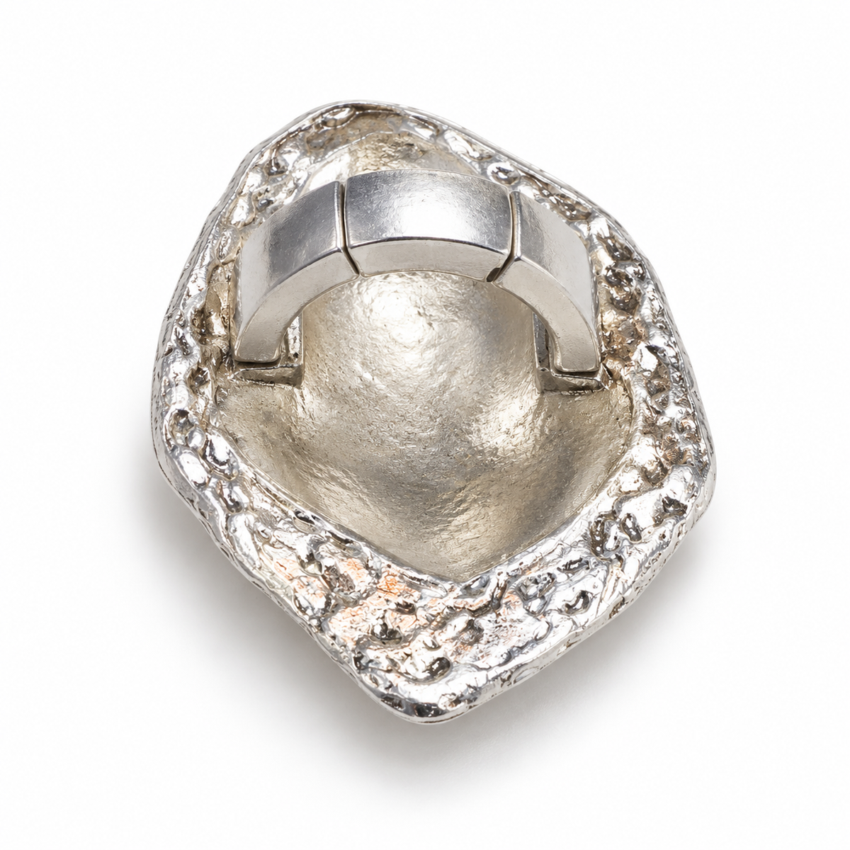 Back of the silver-tone Sculpted Metal Stretch Ring showing its segmented stretch band