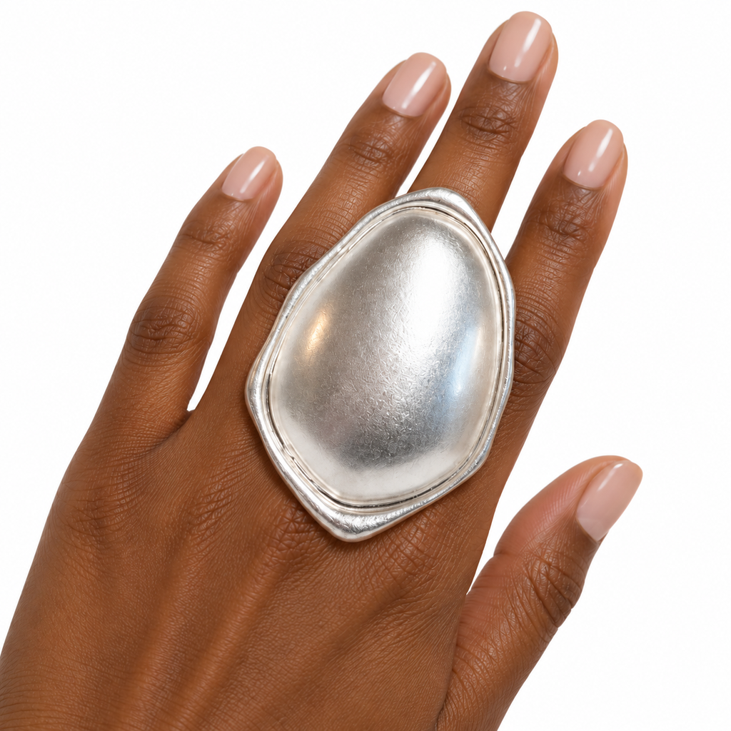 Silver-tone Sculpted Metal Stretch Ring worn on a finger