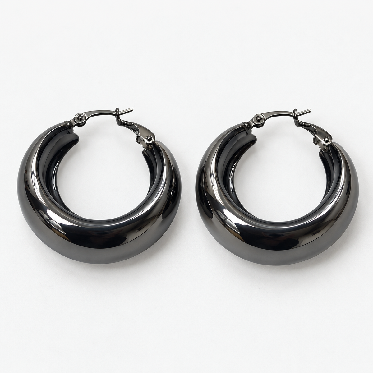 Front flat-lay view of dark gunmetal medium wide hoop earrings