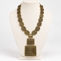 Geometric spiral metal statement necklace, bust display