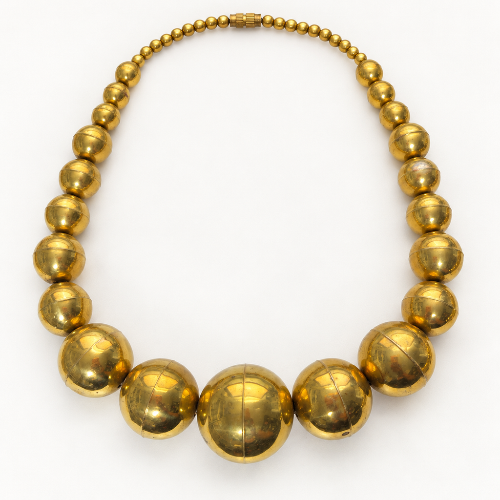Vintage graduated brass ball necklace — flat with clasp closed