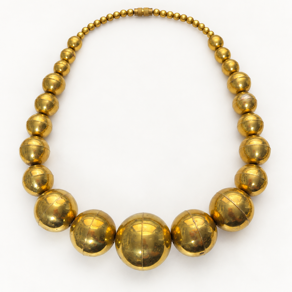 Vintage graduated brass ball necklace — flat with clasp closed
