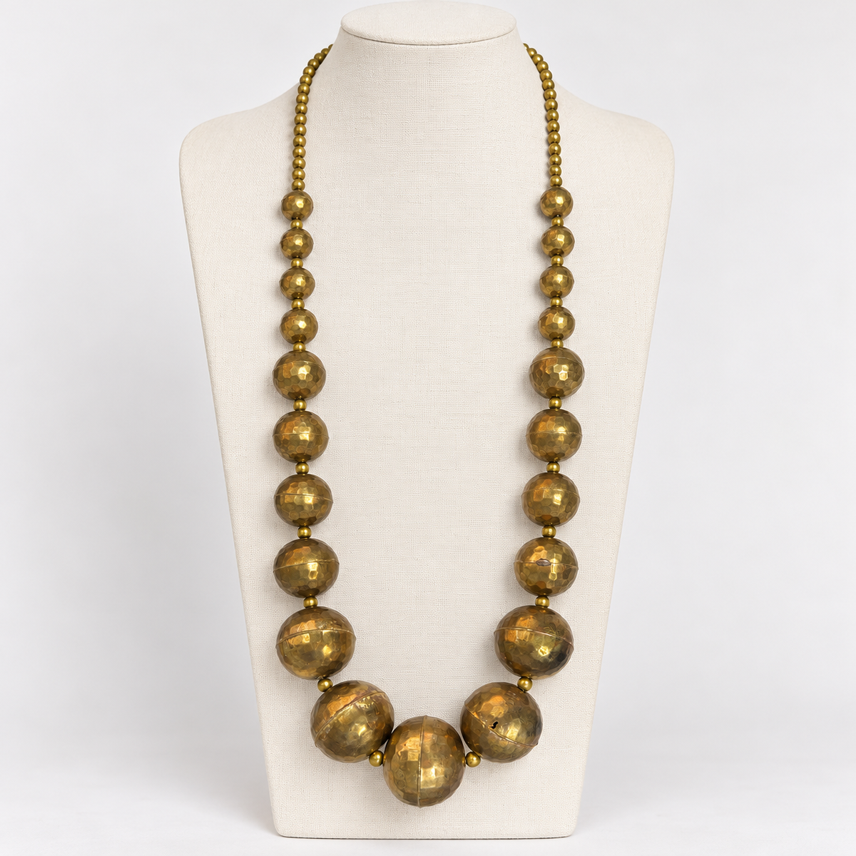Vintage hammered brass ball necklace, bust display