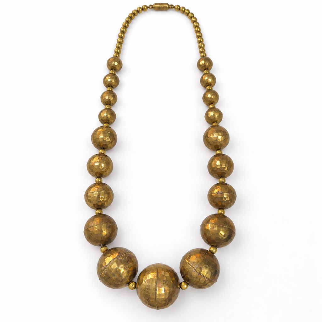 Vintage hammered brass ball necklace, flat view
