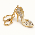 White jeweled high heel purse charm keychain, three-quarter view